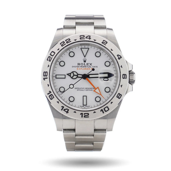 A Rolex Explorer II steel wristwatch with white dial, on a white background