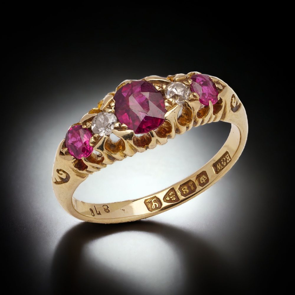 Antique gold five-stone ruby and diamond ring.