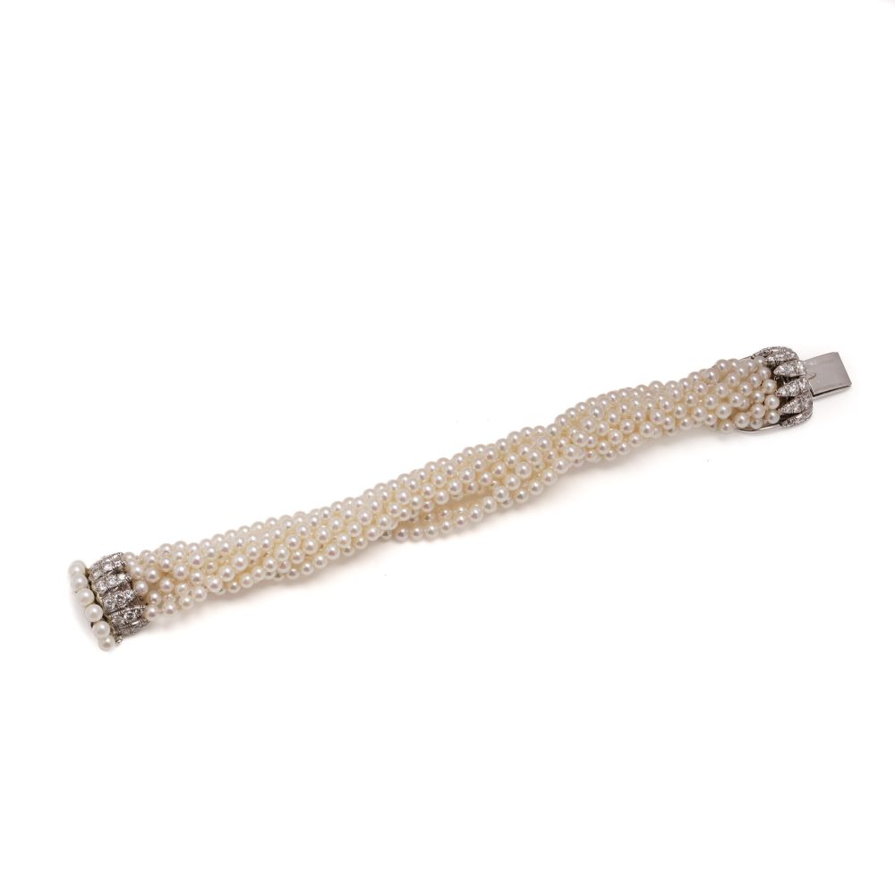 Van Cleef & Arpels Multi -Strand Pearl And Diamond Bracelet in Platinum