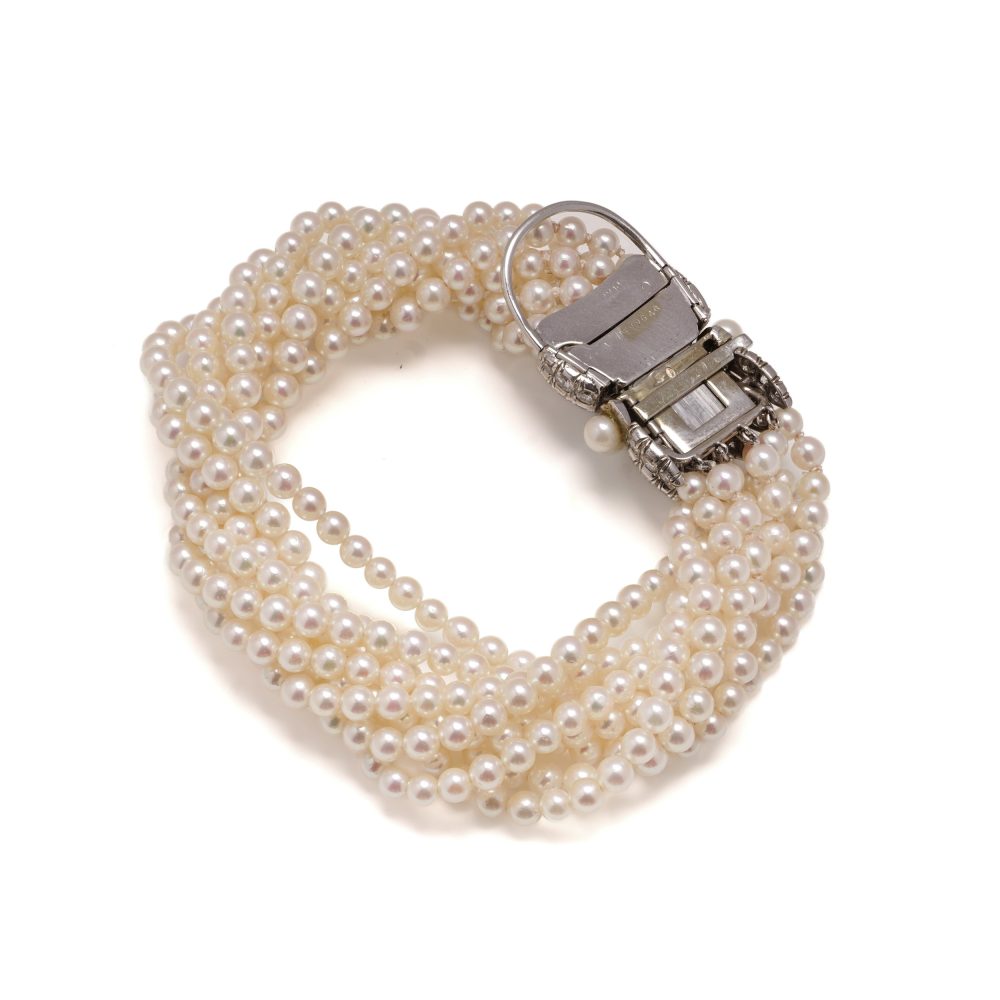 Van Cleef & Arpels Multi -Strand Pearl And Diamond Bracelet in Platinum
