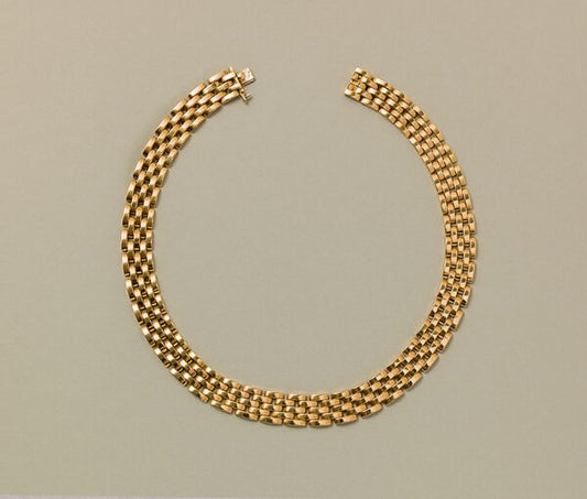 Cartier Panthere 18ct Yellow Gold Necklace; classic five-row choker necklace with a grain de riz pattern. Signed and numbered Cartier, 632144, French