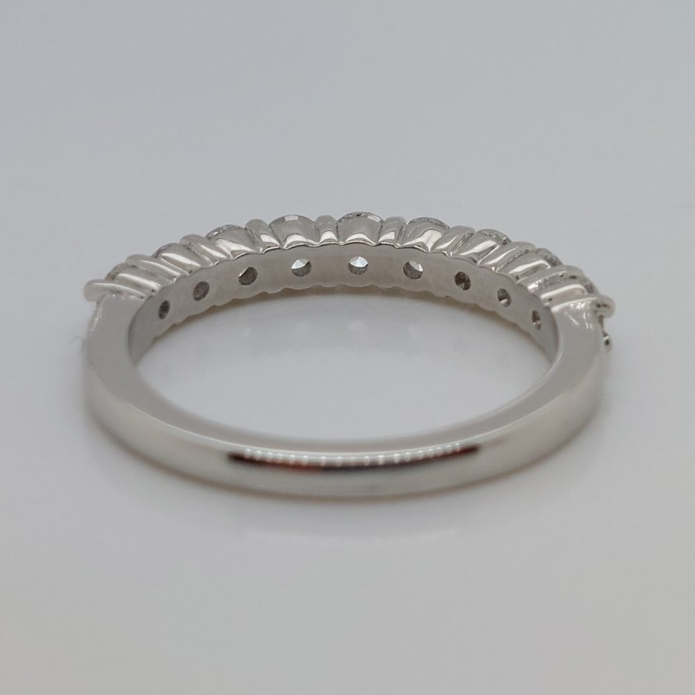 Nine Stone Brilliant Cut Diamond Platinum Half Eternity Ring
