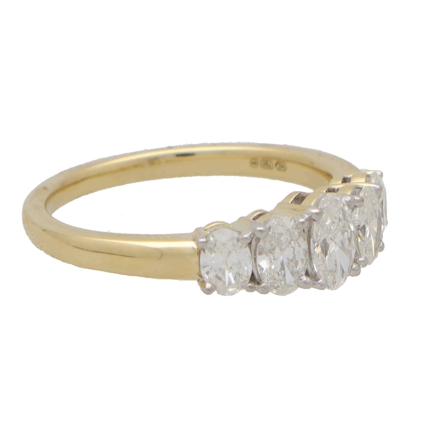 Diamond five stone ring set in yellow and white gold.