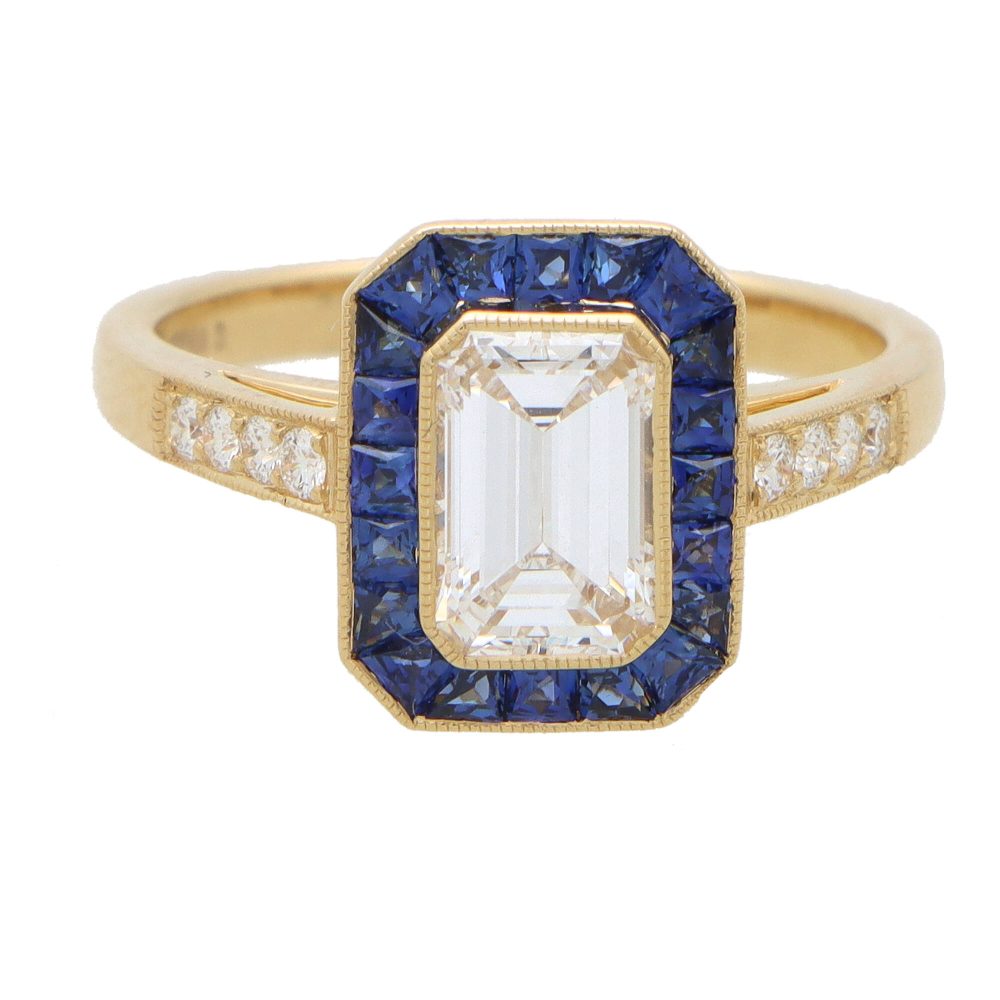 Diamond and sapphire target ring in gold.