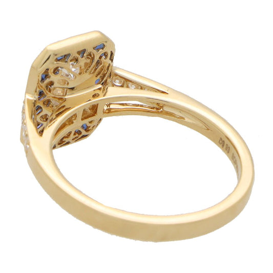 Diamond and sapphire target ring in gold.