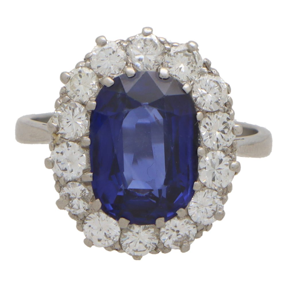 3.66 carat sapphire and diamond cluster ring in platinum.