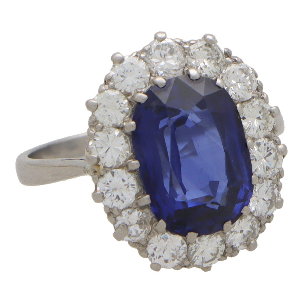 3.66 carat sapphire and diamond cluster ring in platinum.