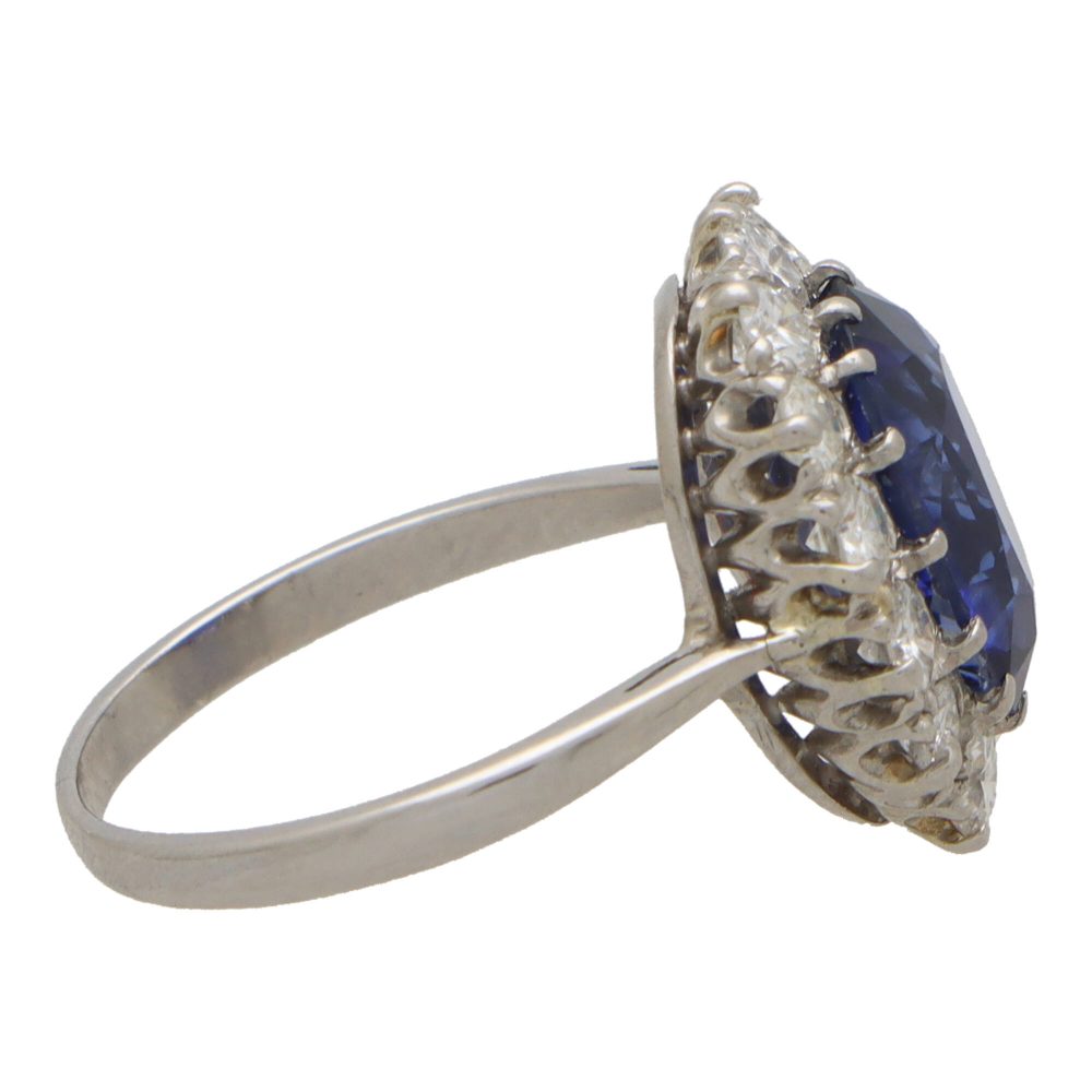 3.66 carat sapphire and diamond cluster ring in platinum.