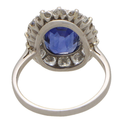 3.66 carat sapphire and diamond cluster ring in platinum.