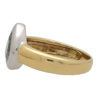 Vintage aquamarine ring in yellow and white gold.