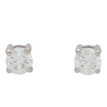 Diamond stud earrings in white gold.