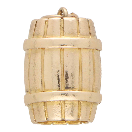 A yellow gold barrel charm, on a white background