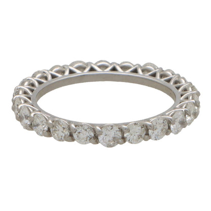 Diamond full eternity ring in white gold.