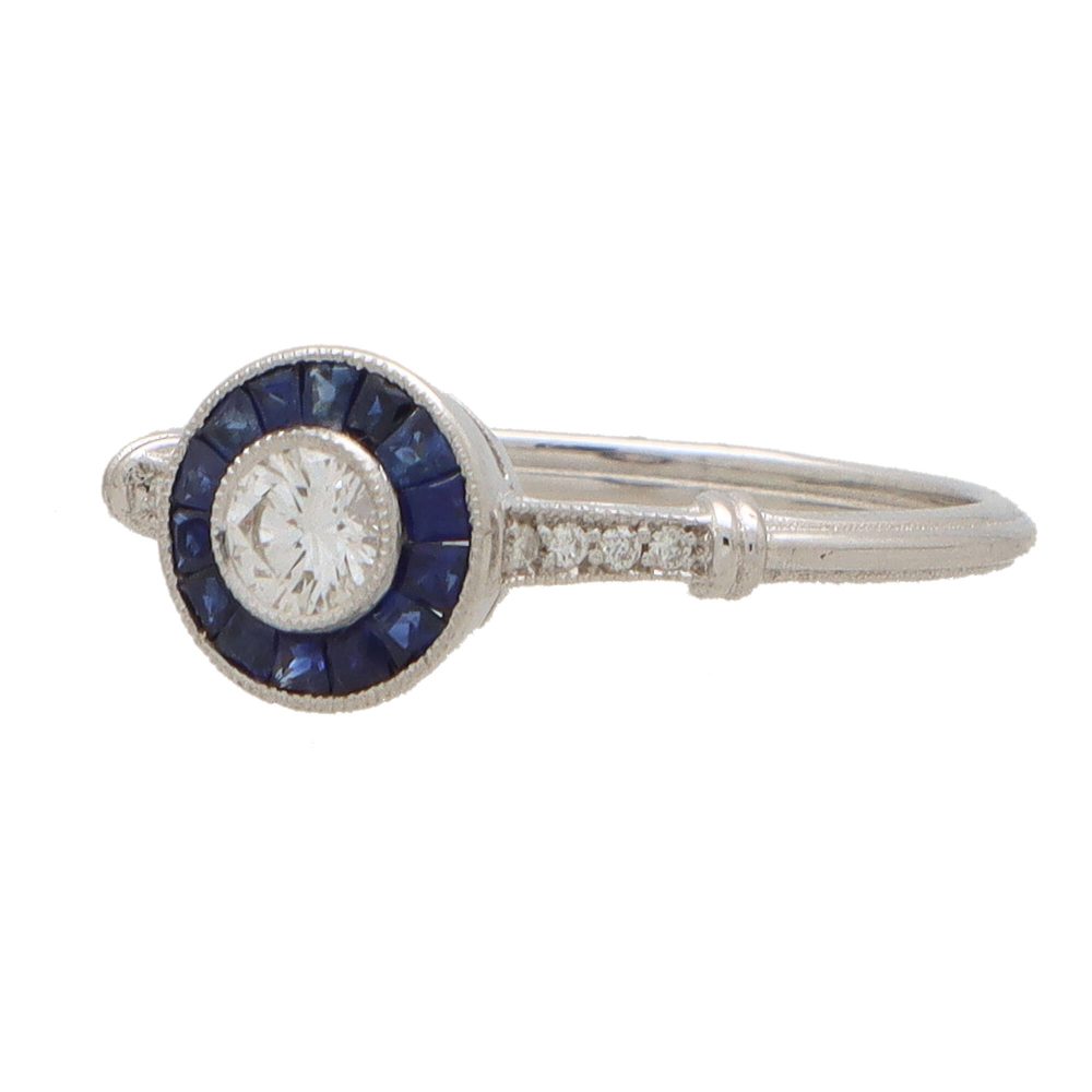 Diamond and sapphire target ring in white gold.