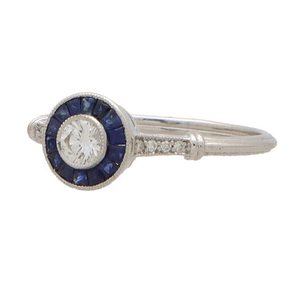 Diamond and sapphire target ring in white gold.