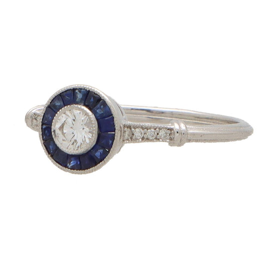 Diamond and sapphire target ring in white gold.