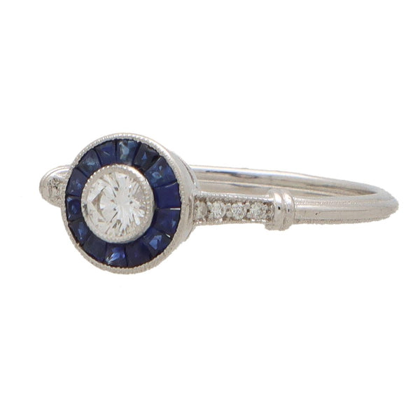 Diamond and sapphire target ring in white gold.