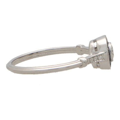 Diamond and sapphire target ring in white gold.