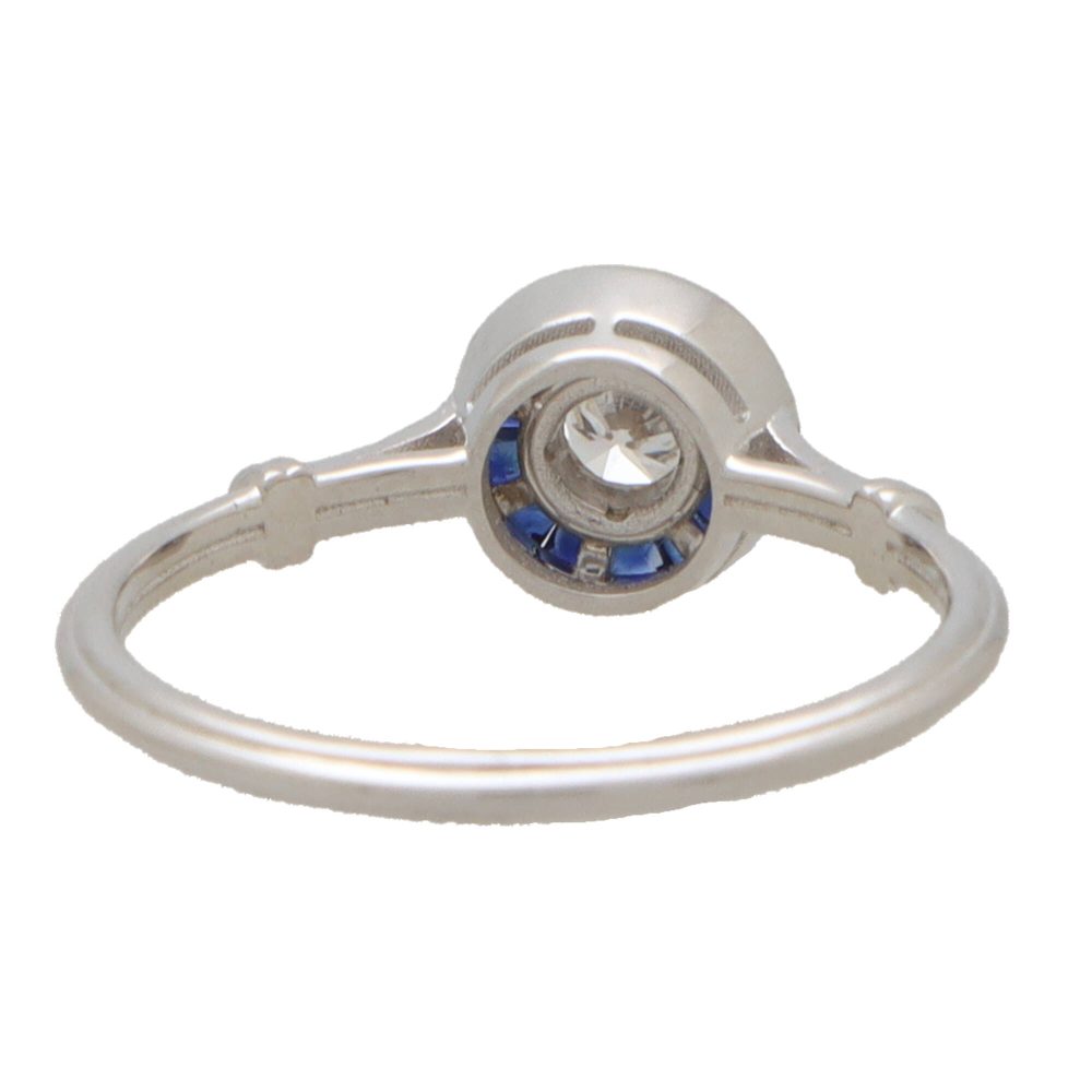 Diamond and sapphire target ring in white gold.