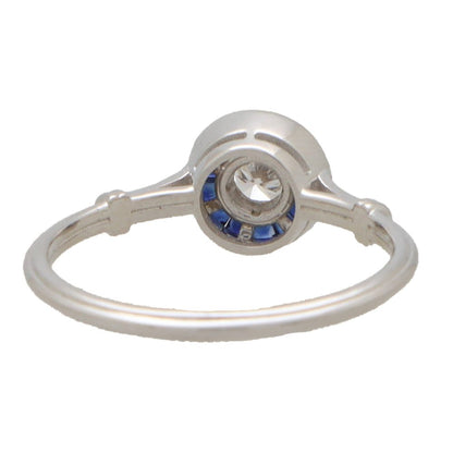 Diamond and sapphire target ring in white gold.