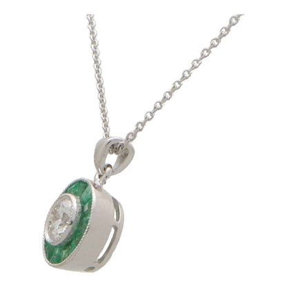 Diamond and emerald necklace in white gold.
