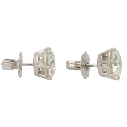 Solitaire certified diamond stud earrings set in gold,