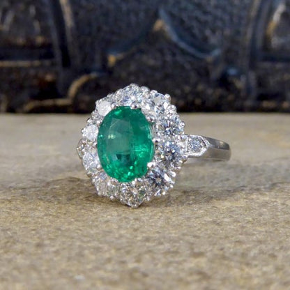 Oval 1.37ct Emerald and 1.00ct Diamond Cluster Ring