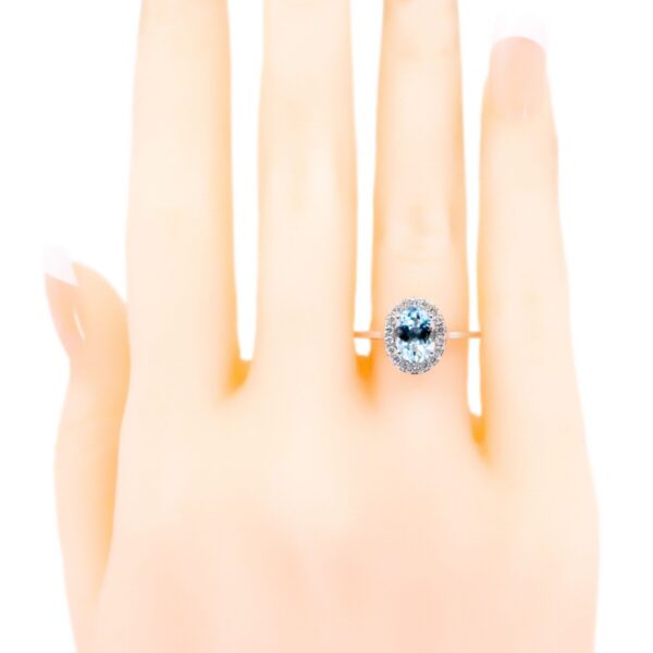 Oval Aquamarine And Diamond Cluster 18ct White Gold Ring