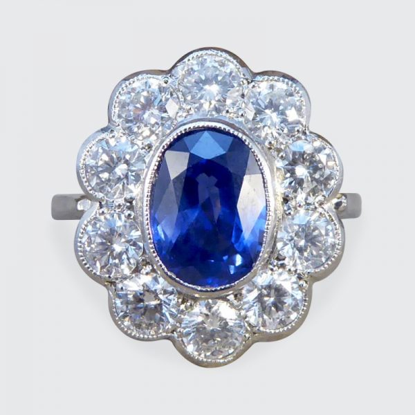 Oval Sapphire 1.70ct and Brilliant Cut Diamond Cluster Ring