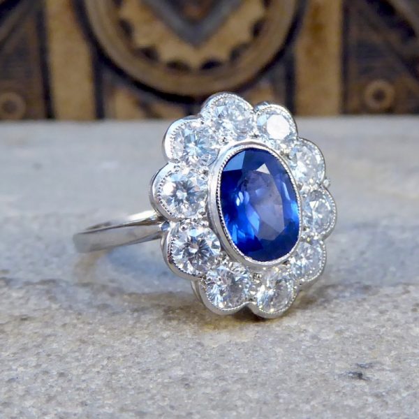 Oval Sapphire 1.70ct and Brilliant Cut Diamond Cluster Ring