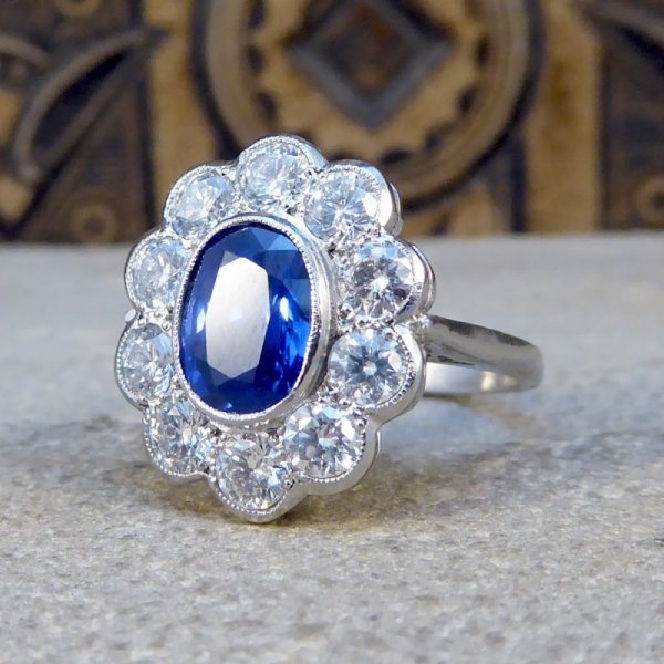 Oval Sapphire 1.70ct and Brilliant Cut Diamond Cluster Ring