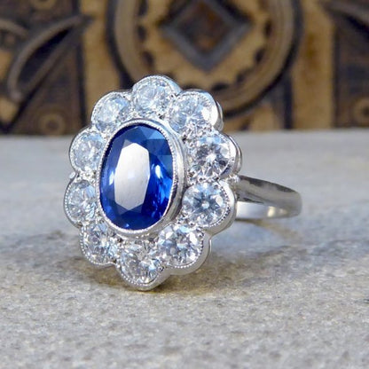 Oval Sapphire 1.70ct and Brilliant Cut Diamond Cluster Ring