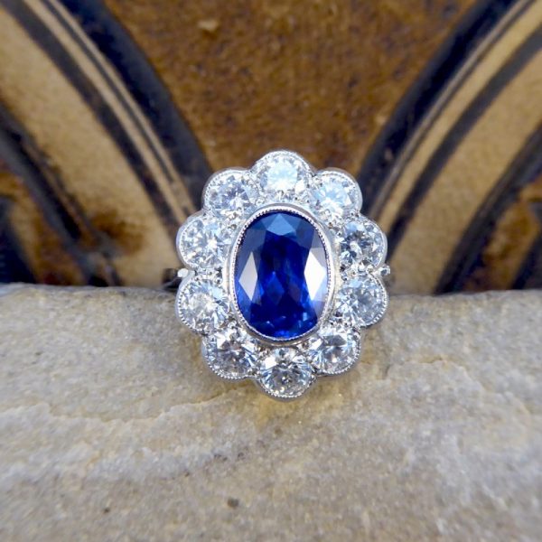 Oval Sapphire 1.70ct and Brilliant Cut Diamond Cluster Ring