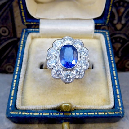 Oval Sapphire 1.70ct and Brilliant Cut Diamond Cluster Ring