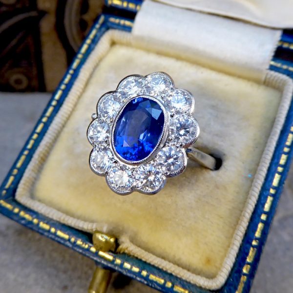 Oval Sapphire 1.70ct and Brilliant Cut Diamond Cluster Ring