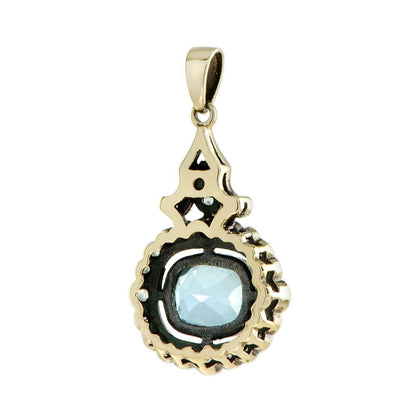 Blue Topaz and White Sapphire Pendant in 9ct Gold