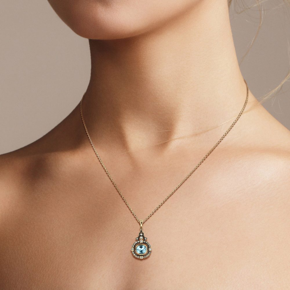 Blue Topaz and White Sapphire Pendant in 9ct Gold