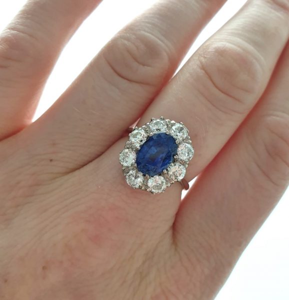 Vintage sapphire engagement ring oval diamonds cluster