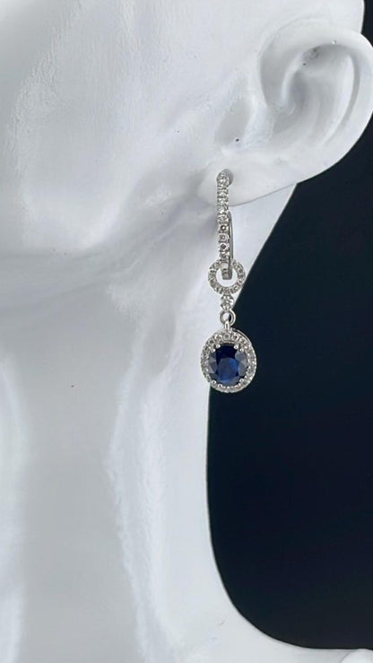 Sapphire and diamond cluster halo drop earrings 18ct