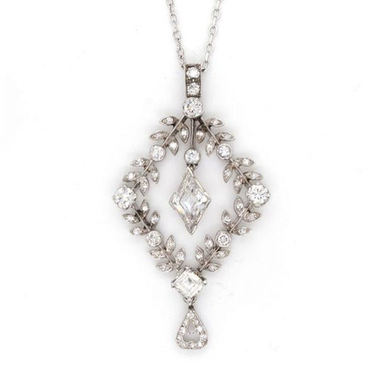 Antique Diamond and Platinum Openwork Drop Pendant, central diamond drop surrounded by a foliate leaf design. Circa 1915