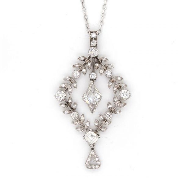 Antique Diamond and Platinum Openwork Drop Pendant, central diamond drop surrounded by a foliate leaf design. Circa 1915