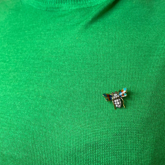 Antique insect brooch in gold and silver set with diamonds enamel and rubies. 