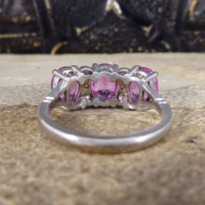 Pink Sapphire Three Stone Ring with Diamond Spacers
