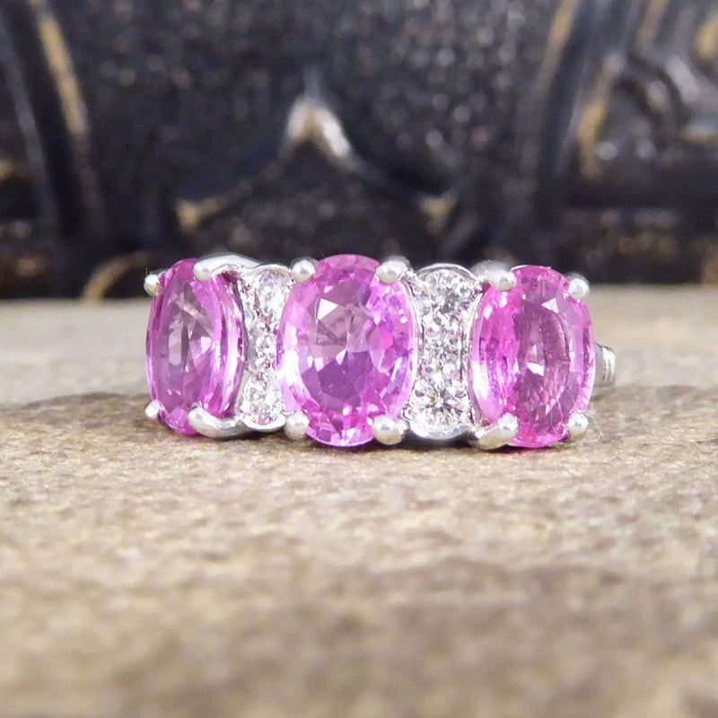 Pink Sapphire Three Stone Ring with Diamond Spacers