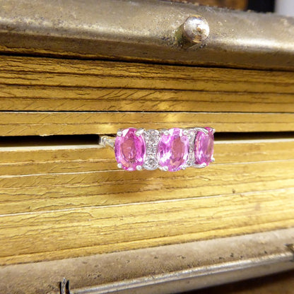 Pink Sapphire Three Stone Ring with Diamond Spacers