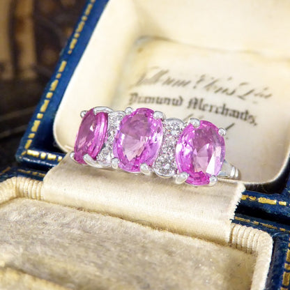 Pink Sapphire Three Stone Ring with Diamond Spacers