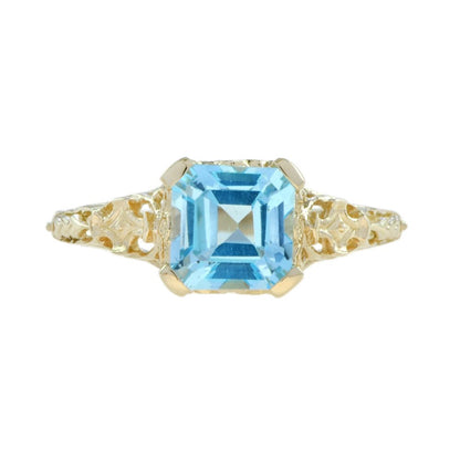 2.7ct Octagonal Cut Blue Topaz and Yellow Gold Filigree Ring