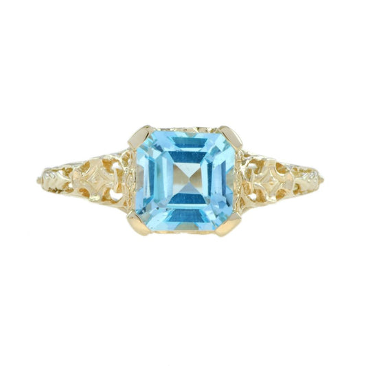 2.7ct Octagonal Cut Blue Topaz and Yellow Gold Filigree Ring