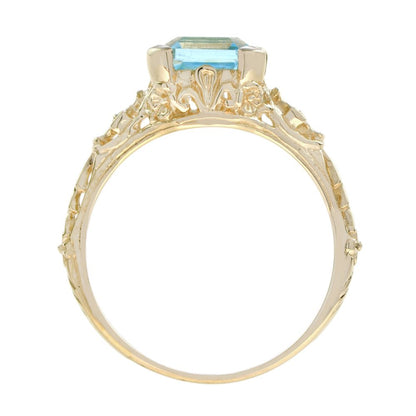 2.7ct Octagonal Cut Blue Topaz and Yellow Gold Filigree Ring
