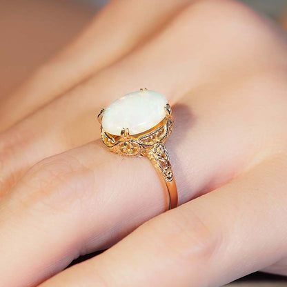 Opal Solitaire Statement Ring in Filigree Yellow Gold